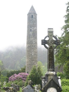 1219827-Celtic-Cross-and-Round-Tower-in-Glendalough-Monastic-site-0